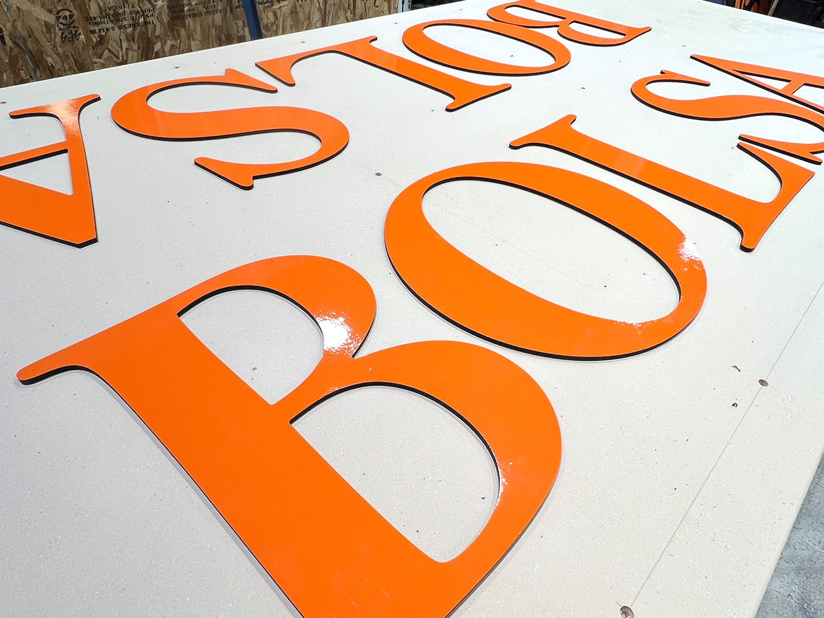 6mm PVC with orange vinyl coated face reading BOLSA